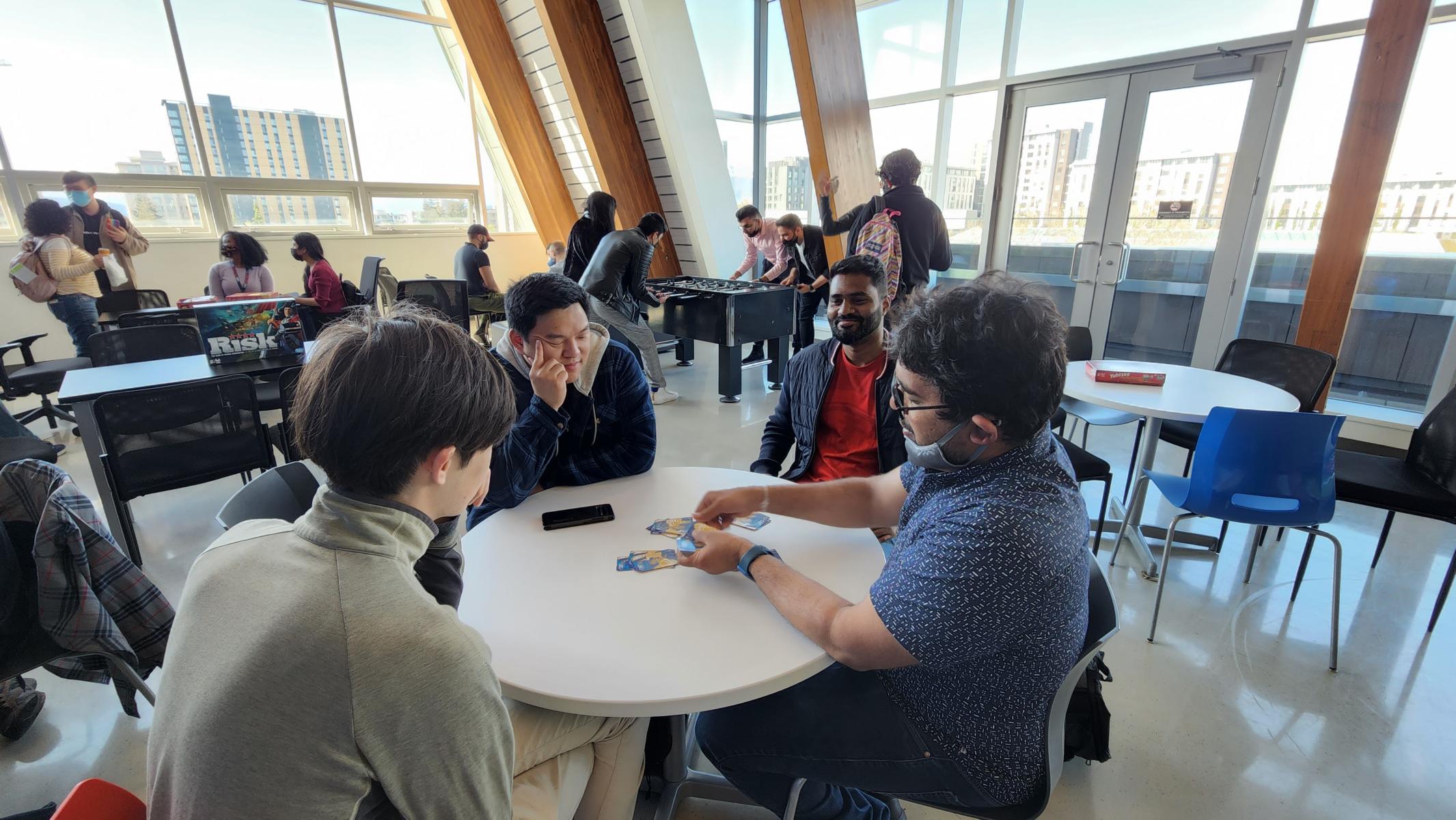 gradaute students around a table