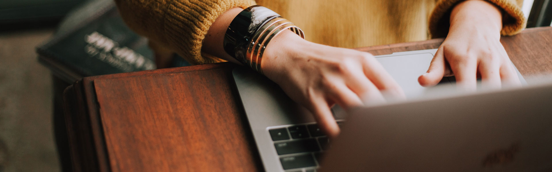 Image of hands typing on a keyboard