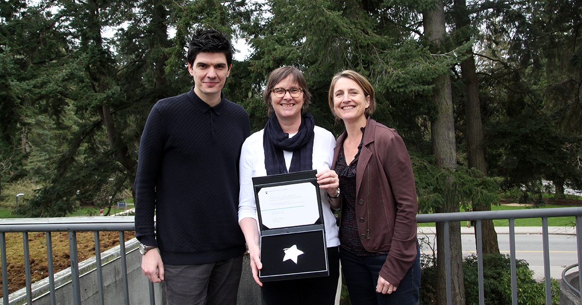 Efe Peker, Susan Porter and Jenny Phelps with the 2016/17 Helen McCrae Award. 