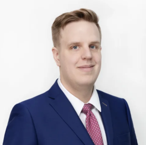 white man wearing a suit with a white background