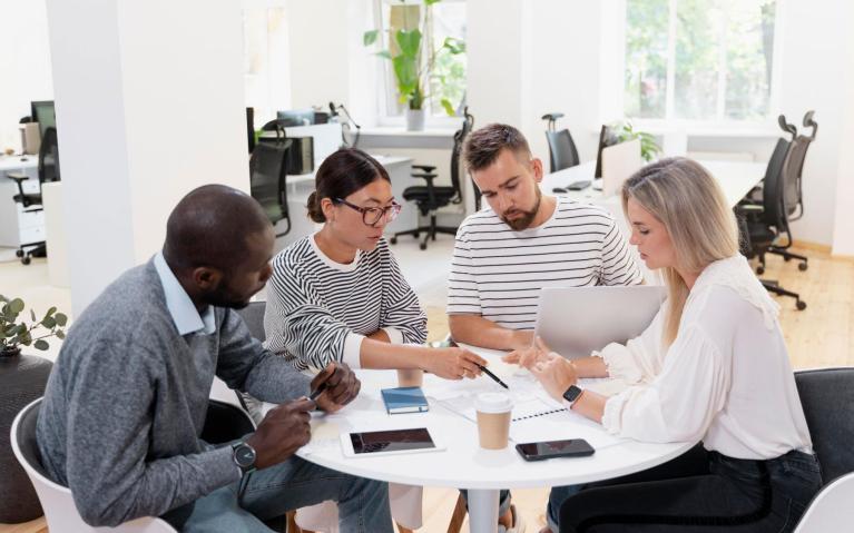 group of student sitting around a table