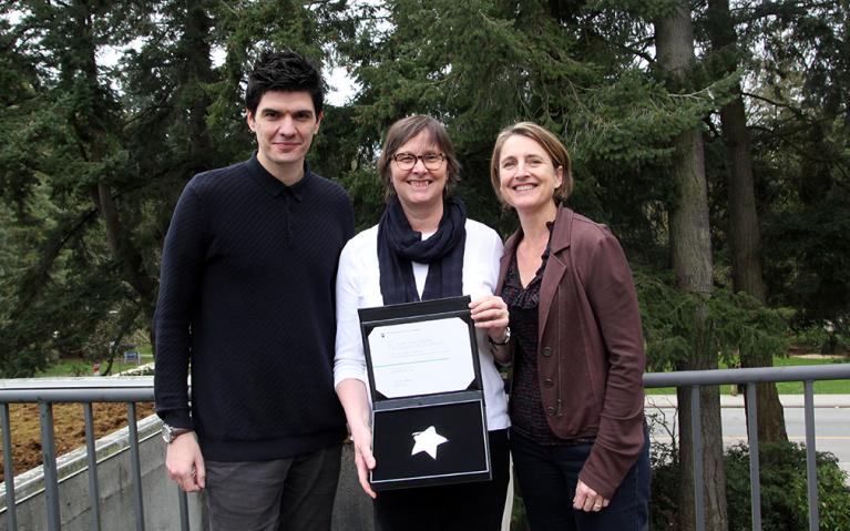 Efe Peker, Susan Porter and Jenny Phelps with the 2016/17 Helen McCrae Award. 