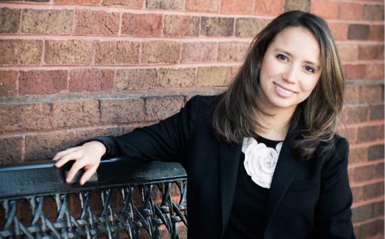 Kylynda Bauer sitting on a bench