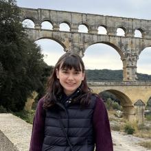 Taylor Swift-LaPointe in front of an aqueduct