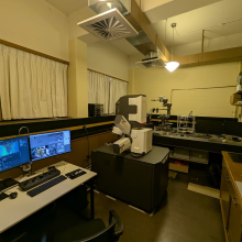lab with desks and a microsope