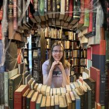 Jocelyn Coupland surrounded by books