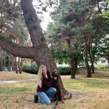 Rachel Ramsden in the park with their dog